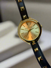 Michael Kors watch (LG) Women's watch- Black & Gold Stud wrap watch, Circular face, 16 inch leather band, Studded Wrap (Retail value $275)